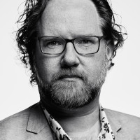 A photo with a portrait of Aaron Gustafson