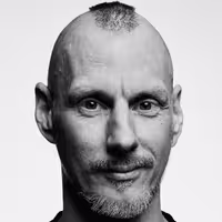 A photo with a portrait of Guido Bollenbach